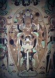 The Yulin Caves (Chinese: 榆林窟; pinyin: Yulin kū) are a Buddhist cave temple complex in Guazhou County, Gansu Province, China. The site is located some 100 km east of the oasis town of Dunhuang and the Mogao Caves. It takes its name from the eponymous elm trees lining the Yulin River, which flows through the site and separates the two cliffs from which the caves have been excavated.<br/><br/>

The forty-two caves house some 250 polychrome statues and 4,200 square metres of wall paintings, dating from the Tang Dynasty to the Yuan Dynasty (7th to 14th centuries).  The site was among the first in China to be designated for protection in 1961 as a Major National Historical and Cultural Site. In 2008 the Yulin Grottoes were submitted for future inscription on the UNESCO World Heritage List as part of the Chinese Section of the Silk Road.